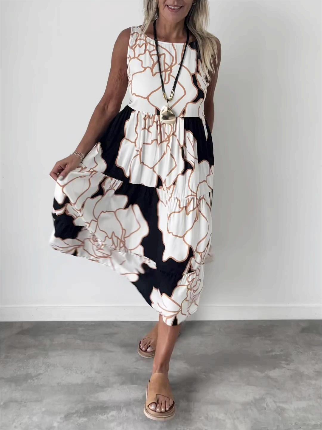 Marga | Mouwloze Midi Jurk met Abstracte Print